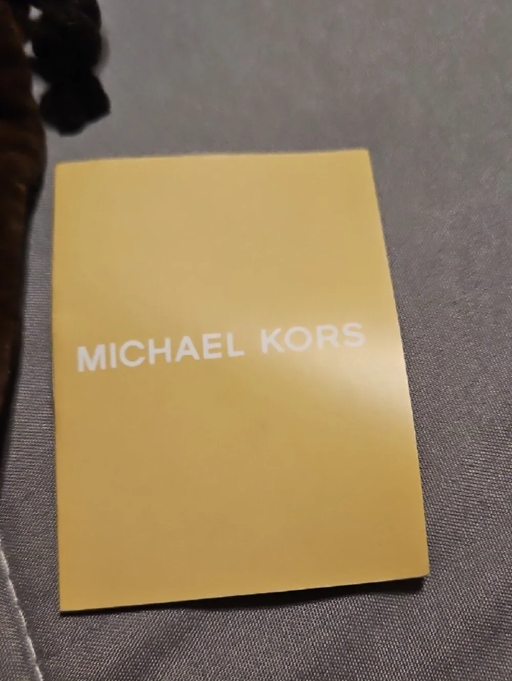 Michael Kors gold tone
